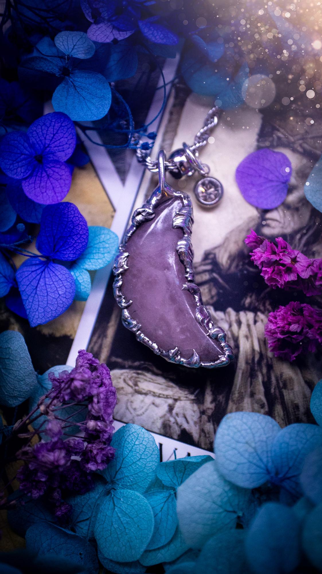 Beautifully bespoke and handcrafted, rose quartz, soft soldered moon pendant necklace. This necklace has been handmade using the soft solder method with lead free solder with mix metals including silver. Featuring a gorgeous rose quartz moon that is a dusty pink colour. This piece is very unique and comes with its own little cubic zirconia charm. This pendant necklace would be suitable for anyone who loves crystals and jewellery, and that also loves a gothic and witchy vibe! Total soul jewellery