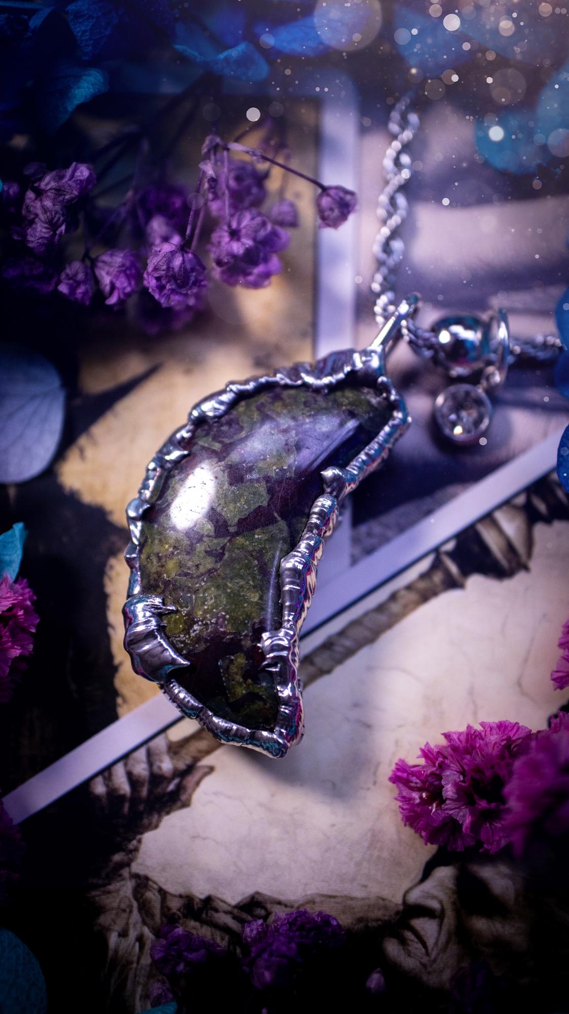 Beautifully bespoke and handcrafted, blood stone, soft soldered moon pendant necklace. This necklace has been handmade using the soft solder method with lead free solder with mix metals including silver. Featuring a gorgeous blood stone moon with stunning patterns. This piece is very unique and comes with its own little cubic zirconia charm. This pendant necklace would be suitable for anyone who loves crystals and jewellery, and that also loves a gothic and witchy vibe! Total soul jewellery