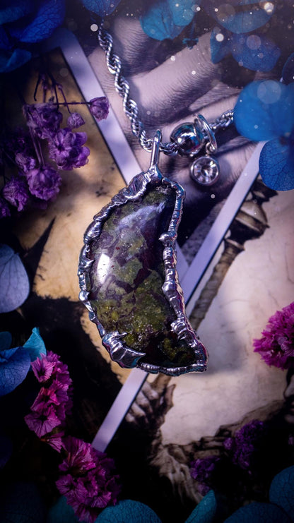 Beautifully bespoke and handcrafted, blood stone, soft soldered moon pendant necklace. This necklace has been handmade using the soft solder method with lead free solder with mix metals including silver. Featuring a gorgeous blood stone moon with stunning patterns. This piece is very unique and comes with its own little cubic zirconia charm. This pendant necklace would be suitable for anyone who loves crystals and jewellery, and that also loves a gothic and witchy vibe! Total soul jewellery