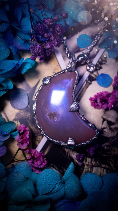 Beautifully bespoke, aurora coated agate, soft soldered moon pendant necklace. This necklace has been handmade using the soft solder method with lead free solder with mix metals including silver. Featuring a gorgeous aurora coated agate moon with a sparkly druzy pocket. This piece is very unique and comes with its own little cubic zirconia charm. This pendant necklace would be suitable for anyone who loves crystals and jewellery, and that also loves a gothic and witchy vibe! Total soul jewellery