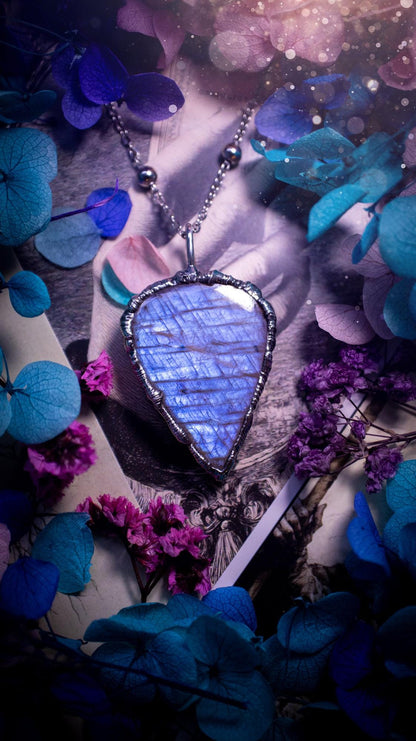 Handmade and beautiful, flashy belomorite, soft soldered pendant necklace. This pendant necklace features the most gorgeous and flashy belomorite moonstone crystal, full of glittery shimmer and a deep lovely blue hue. Handcrafted using the soft solder method, also known as the tiffany technique, an ancient technique used to created stained glass windows. The solder used is lead free and totally safe to wear, it contains elements of silver and polishes up to a high lustre. Gothic witchy jewellery