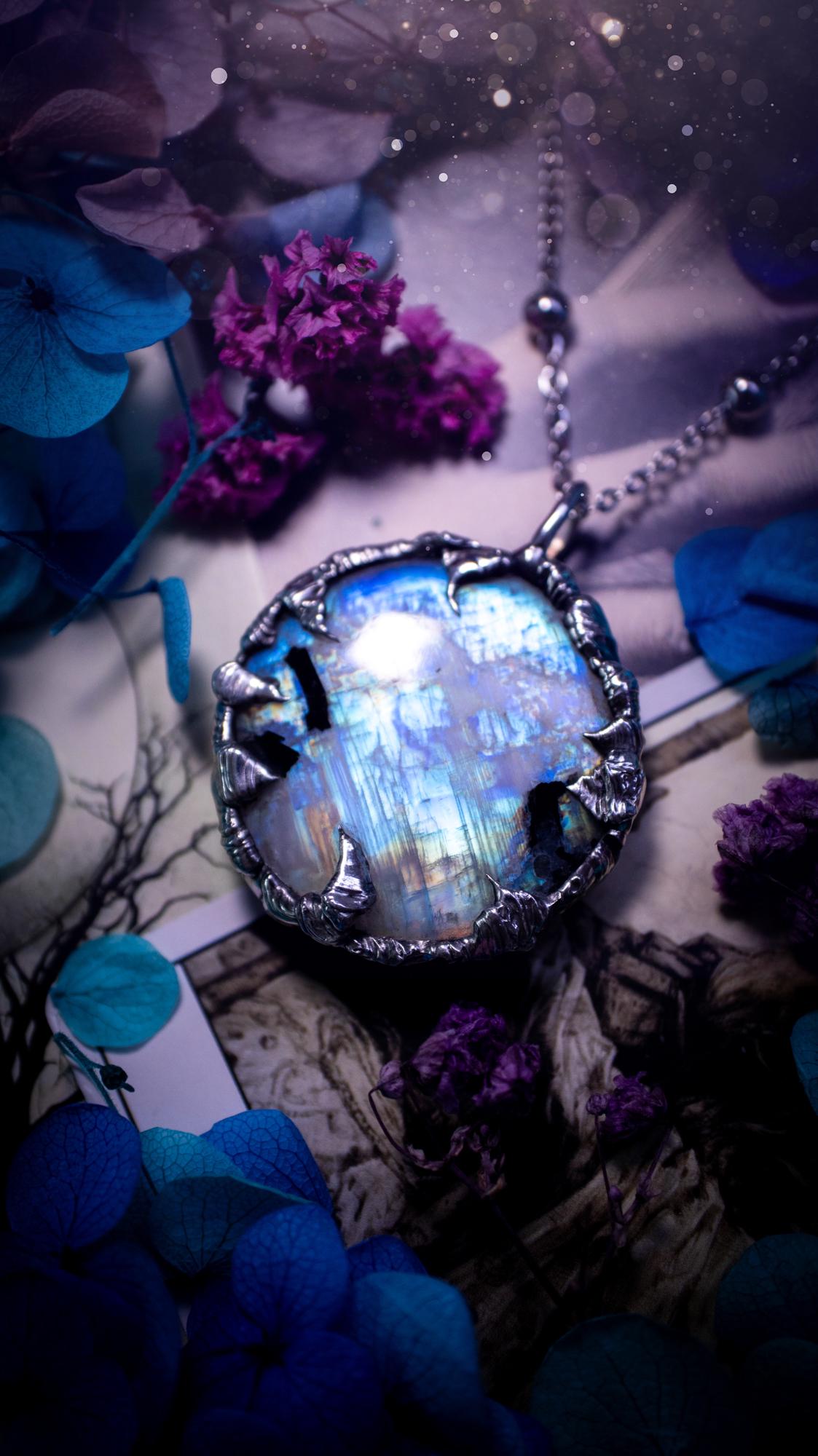 Handmade and beautiful, flashy rainbow moonstone, soft soldered pendant necklace. This pendant necklace features the most gorgeous and flashy moonstone crystal, full of glittery shimmer and a deep lovely blue hue. Handcrafted using the soft solder method, also known as the tiffany technique, an ancient technique used to created stained glass windows. The solder used is lead free and totally safe to wear, it contains elements of silver and polishes up to a high lustre. Gothic witchy jewellery