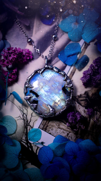 Handmade and beautiful, flashy rainbow moonstone, soft soldered pendant necklace. This pendant necklace features the most gorgeous and flashy moonstone crystal, full of glittery shimmer and a deep lovely blue hue. Handcrafted using the soft solder method, also known as the tiffany technique, an ancient technique used to created stained glass windows. The solder used is lead free and totally safe to wear, it contains elements of silver and polishes up to a high lustre. Gothic witchy jewellery