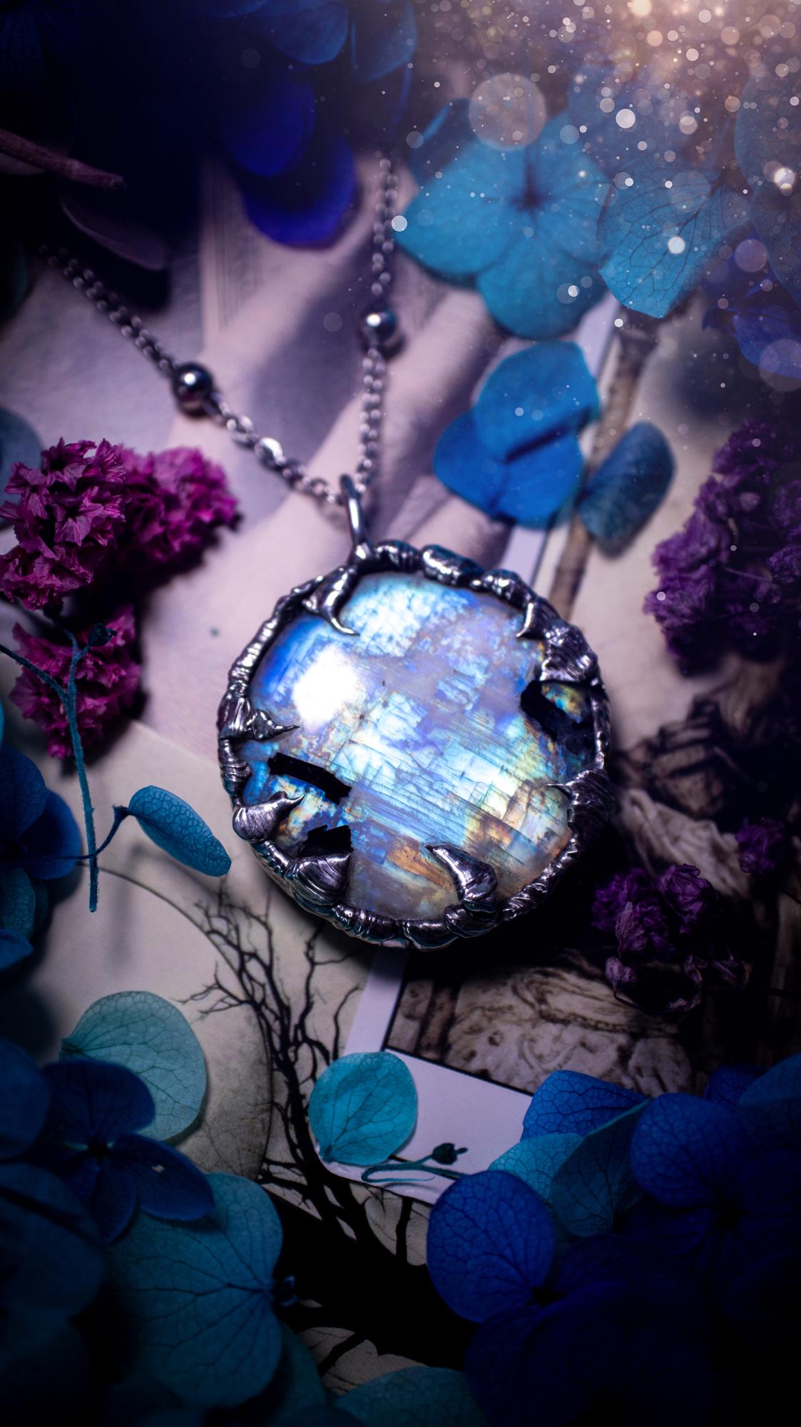 Handmade and beautiful, flashy rainbow moonstone, soft soldered pendant necklace. This pendant necklace features the most gorgeous and flashy moonstone crystal, full of glittery shimmer and a deep lovely blue hue. Handcrafted using the soft solder method, also known as the tiffany technique, an ancient technique used to created stained glass windows. The solder used is lead free and totally safe to wear, it contains elements of silver and polishes up to a high lustre. Gothic witchy jewellery