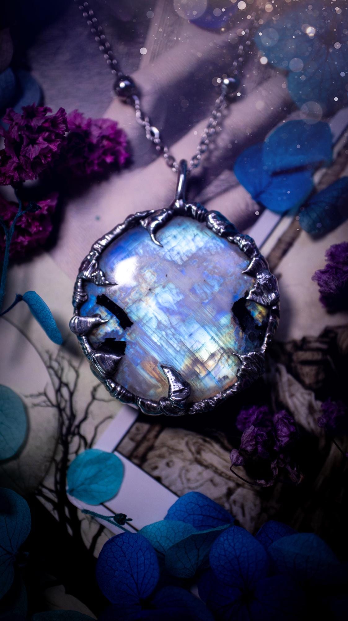 Handmade and beautiful, flashy rainbow moonstone, soft soldered pendant necklace. This pendant necklace features the most gorgeous and flashy moonstone crystal, full of glittery shimmer and a deep lovely blue hue. Handcrafted using the soft solder method, also known as the tiffany technique, an ancient technique used to created stained glass windows. The solder used is lead free and totally safe to wear, it contains elements of silver and polishes up to a high lustre. Gothic witchy jewellery