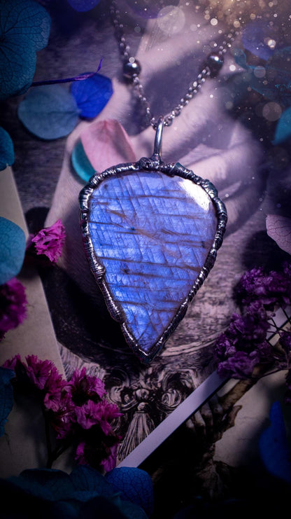 Handmade and beautiful, flashy belomorite, soft soldered pendant necklace. This pendant necklace features the most gorgeous and flashy belomorite moonstone crystal, full of glittery shimmer and a deep lovely blue hue. Handcrafted using the soft solder method, also known as the tiffany technique, an ancient technique used to created stained glass windows. The solder used is lead free and totally safe to wear, it contains elements of silver and polishes up to a high lustre. Gothic witchy jewellery