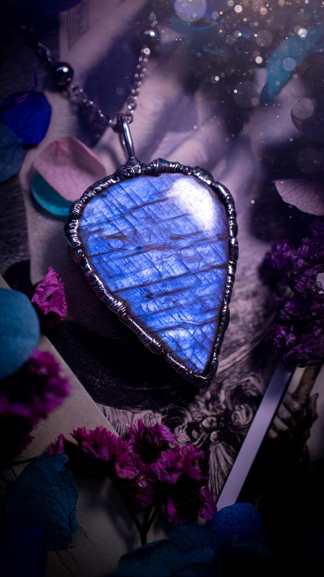 Handmade and beautiful, flashy belomorite, soft soldered pendant necklace. This pendant necklace features the most gorgeous and flashy belomorite moonstone crystal, full of glittery shimmer and a deep lovely blue hue. Handcrafted using the soft solder method, also known as the tiffany technique, an ancient technique used to created stained glass windows. The solder used is lead free and totally safe to wear, it contains elements of silver and polishes up to a high lustre. Gothic witchy jewellery