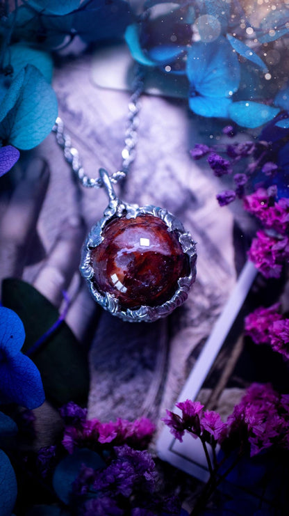 Handmade and bespoke fire quartz sphere soft solder pendant necklace. This unique pendant necklace has a stunning fire quarts crystal that is full of inclusions and little rainbows! Handcrafted using the soft solder method with lead free solder containing mixed metals and silver. The piece has then been polished to a high shine lustre. This pendant is such a bespoke piece and would be ideal for any crystal and jewellery lover. Can be worn both ways. Gothic, witchy and hippy soul jewellery