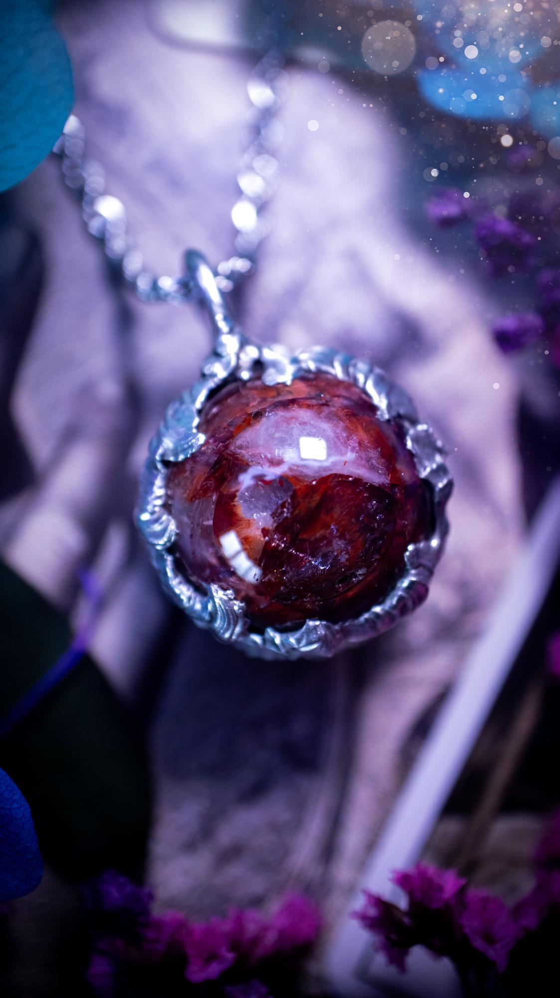 Handmade and bespoke fire quartz sphere soft solder pendant necklace. This unique pendant necklace has a stunning fire quarts crystal that is full of inclusions and little rainbows! Handcrafted using the soft solder method with lead free solder containing mixed metals and silver. The piece has then been polished to a high shine lustre. This pendant is such a bespoke piece and would be ideal for any crystal and jewellery lover. Can be worn both ways. Gothic, witchy and hippy soul jewellery