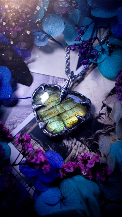 Beautiful, handmade and totally bespoke, green and yellow, labradorite crystal heart, pendant necklace. This jewellery piece has been handcrafted using the soft solder method, using lead free solder that contains silver, then oxidised to create a gothic mystical look. Featuring a beautiful multi flash labradorite heart with the flash shifting from green to yellow. A lovely piece ideal for anyone who loves crystals and jewellery. This is a one of a kind piece with no other the same, gothic design