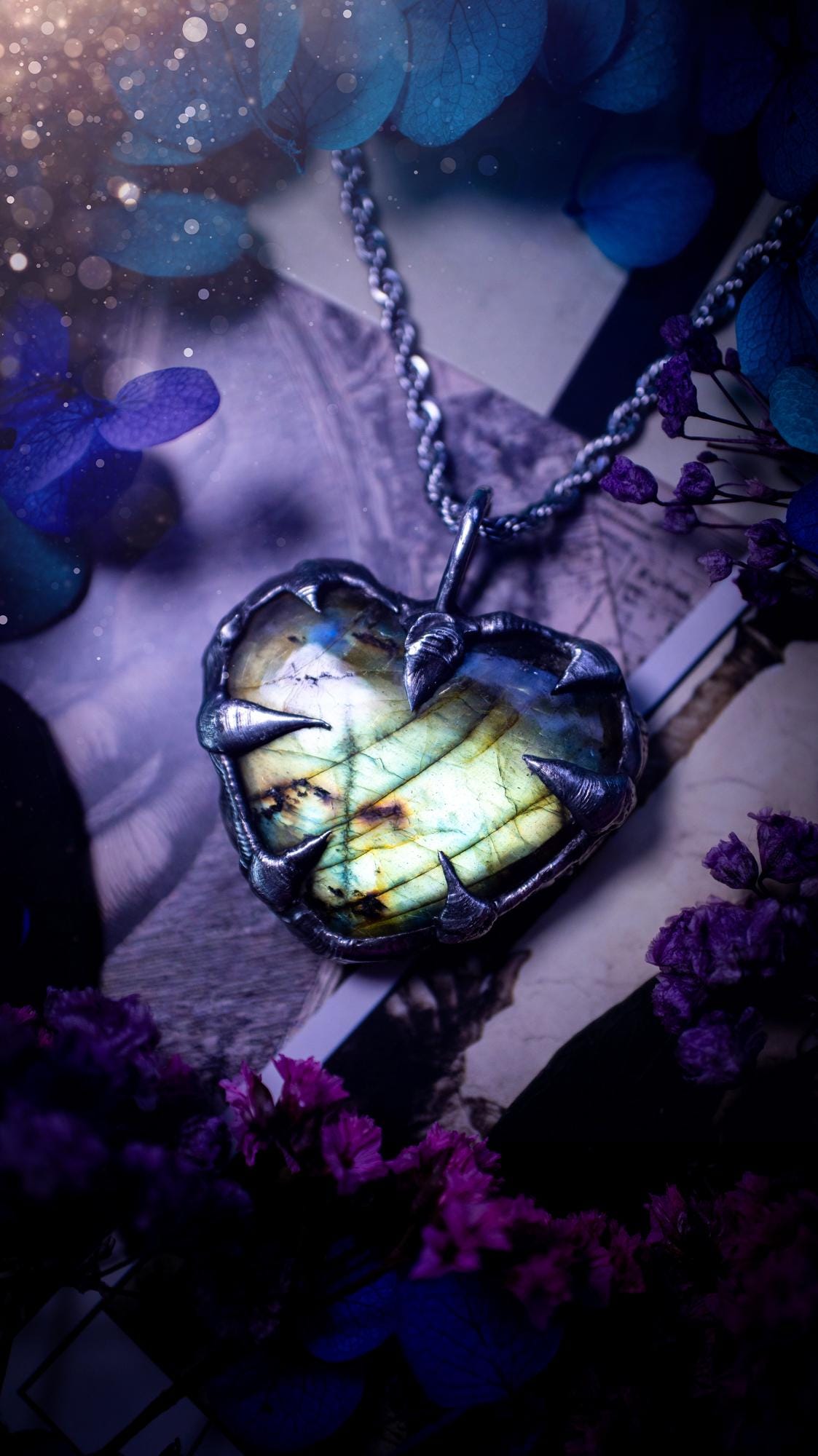 Beautiful, handmade and totally bespoke, green and yellow, labradorite crystal heart, pendant necklace. This jewellery piece has been handcrafted using the soft solder method, using lead free solder that contains silver, then oxidised to create a gothic mystical look. Featuring a beautiful multi flash labradorite heart with the flash shifting from green to yellow. A lovely piece ideal for anyone who loves crystals and jewellery. This is a one of a kind piece with no other the same, gothic design