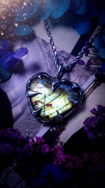 Beautiful, handmade and totally bespoke, green and yellow, labradorite crystal heart, pendant necklace. This jewellery piece has been handcrafted using the soft solder method, using lead free solder that contains silver, then oxidised to create a gothic mystical look. Featuring a beautiful multi flash labradorite heart with the flash shifting from green to yellow. A lovely piece ideal for anyone who loves crystals and jewellery. This is a one of a kind piece with no other the same, gothic design