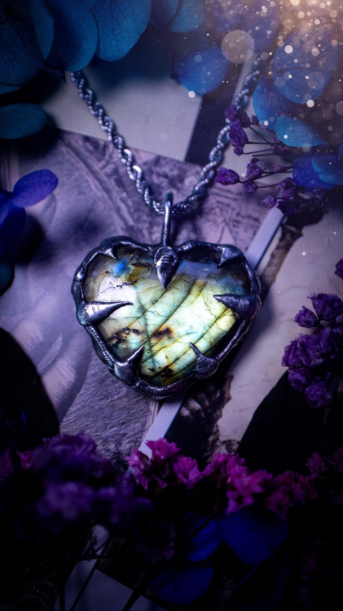 Beautiful, handmade and totally bespoke, green and yellow, labradorite crystal heart, pendant necklace. This jewellery piece has been handcrafted using the soft solder method, using lead free solder that contains silver, then oxidised to create a gothic mystical look. Featuring a beautiful multi flash labradorite heart with the flash shifting from green to yellow. A lovely piece ideal for anyone who loves crystals and jewellery. This is a one of a kind piece with no other the same, gothic design