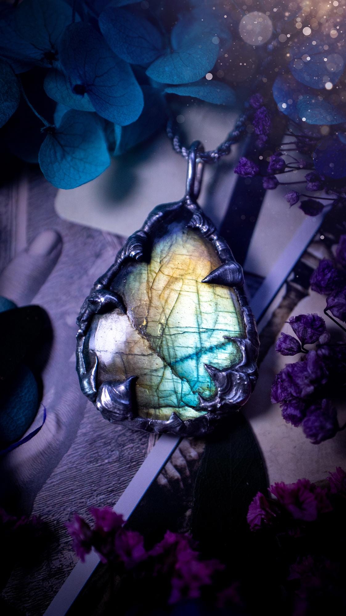 Beautiful, handmade and totally bespoke, green and blue, labradorite crystal, pendant necklace. This jewellery piece has been handcrafted using the soft solder method, using lead free solder that contains silver, then oxidised to create a gothic mystical look. Featuring a beautiful multi flash labradorite crystal with the flash shifting from green to blue. A lovely piece ideal for anyone who loves crystals and jewellery. This is a one of a kind piece with no other the same, gothic design