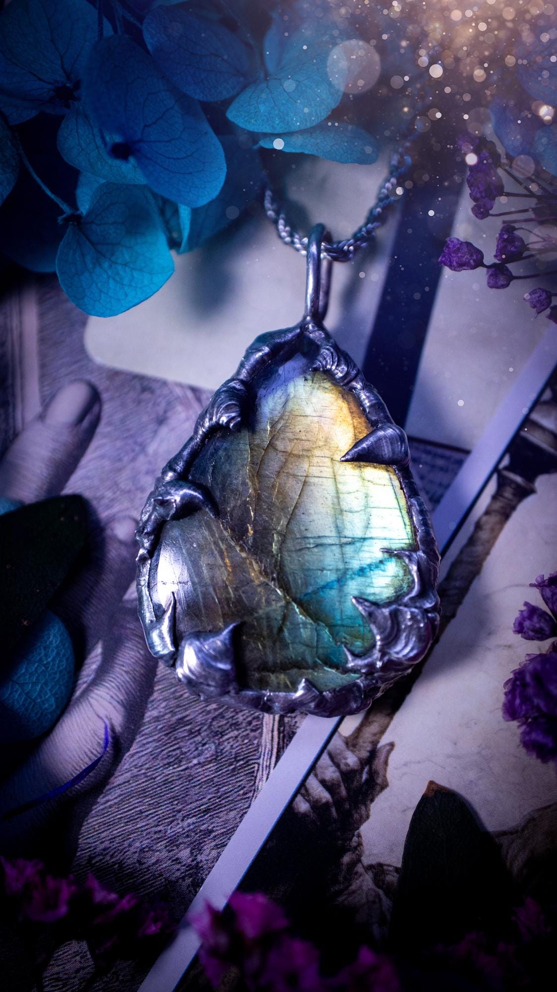 Beautiful, handmade and totally bespoke, green and blue, labradorite crystal, pendant necklace. This jewellery piece has been handcrafted using the soft solder method, using lead free solder that contains silver, then oxidised to create a gothic mystical look. Featuring a beautiful multi flash labradorite crystal with the flash shifting from green to blue. A lovely piece ideal for anyone who loves crystals and jewellery. This is a one of a kind piece with no other the same, gothic design