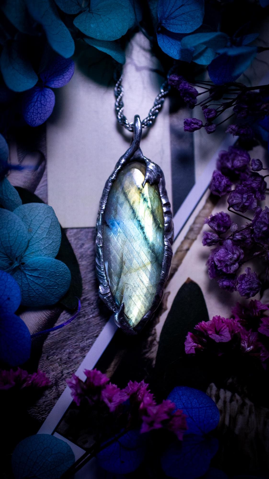 Beautiful, handmade and totally bespoke, green and blue, labradorite crystal, pendant necklace. This jewellery piece has been handcrafted using the soft solder method, using lead free solder that contains silver, then oxidised to create a gothic mystical look. Featuring a beautiful multi flash labradorite crystal with the flash shifting from green to blue. A lovely piece ideal for anyone who loves crystals and jewellery. This is a one of a kind piece with no other the same, gothic design