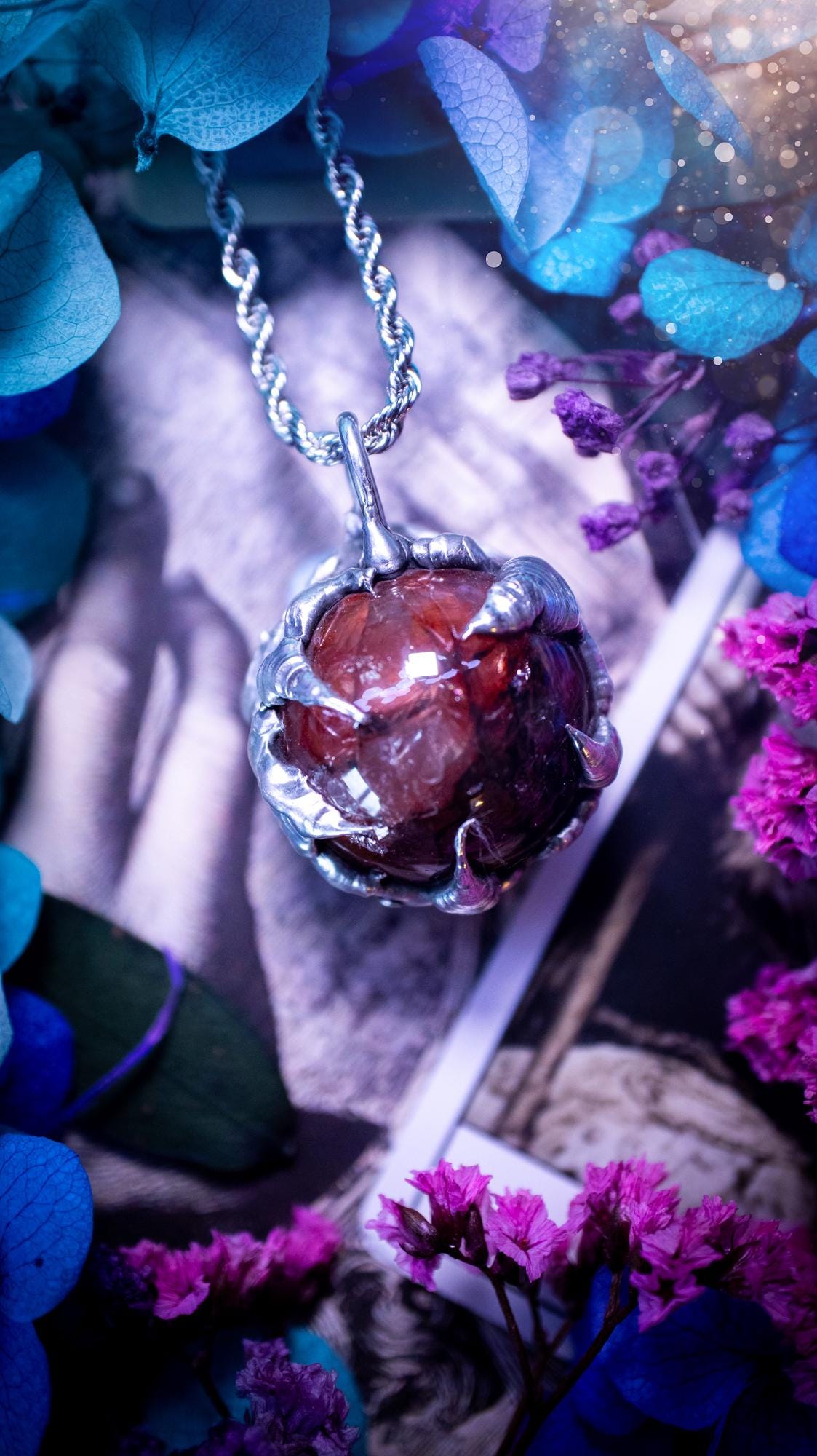 Handmade and bespoke fire quartz sphere soft solder pendant necklace. This unique pendant necklace has a stunning fire quarts crystal that is full of inclusions and little rainbows! Handcrafted using the soft solder method with lead free solder containing mixed metals and silver. The piece has then been polished to a high shine lustre. This pendant is such a bespoke piece and would be ideal for any crystal and jewellery lover. Can be worn both ways. Gothic, witchy and hippy soul jewellery