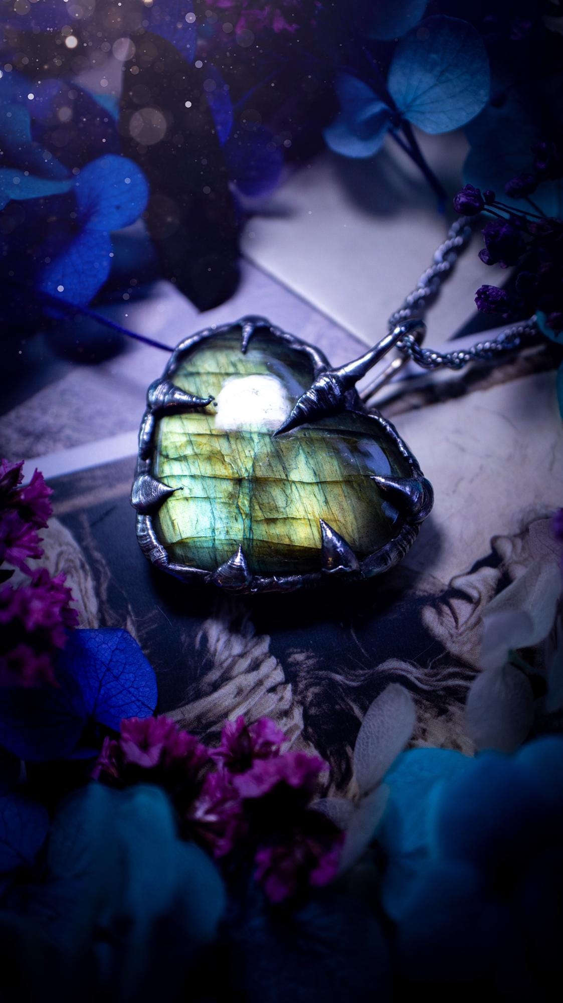 Beautiful, handmade and totally bespoke, green and yellow, labradorite crystal heart, pendant necklace. This jewellery piece has been handcrafted using the soft solder method, using lead free solder that contains silver, then oxidised to create a gothic mystical look. Featuring a beautiful multi flash labradorite heart with the flash shifting from green to yellow. A lovely piece ideal for anyone who loves crystals and jewellery. This is a one of a kind piece with no other the same, gothic design