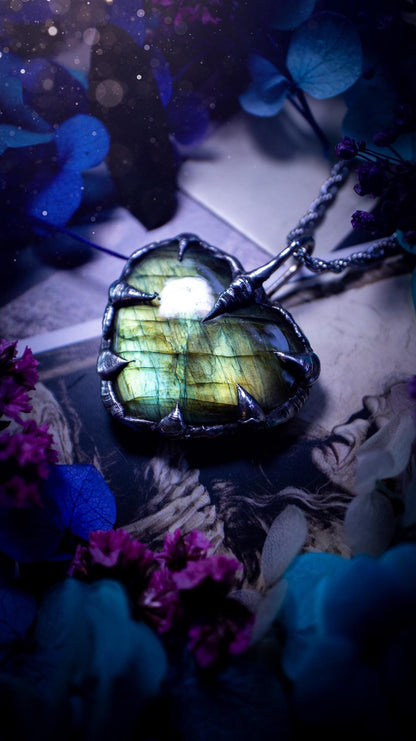 Beautiful, handmade and totally bespoke, green and yellow, labradorite crystal heart, pendant necklace. This jewellery piece has been handcrafted using the soft solder method, using lead free solder that contains silver, then oxidised to create a gothic mystical look. Featuring a beautiful multi flash labradorite heart with the flash shifting from green to yellow. A lovely piece ideal for anyone who loves crystals and jewellery. This is a one of a kind piece with no other the same, gothic design