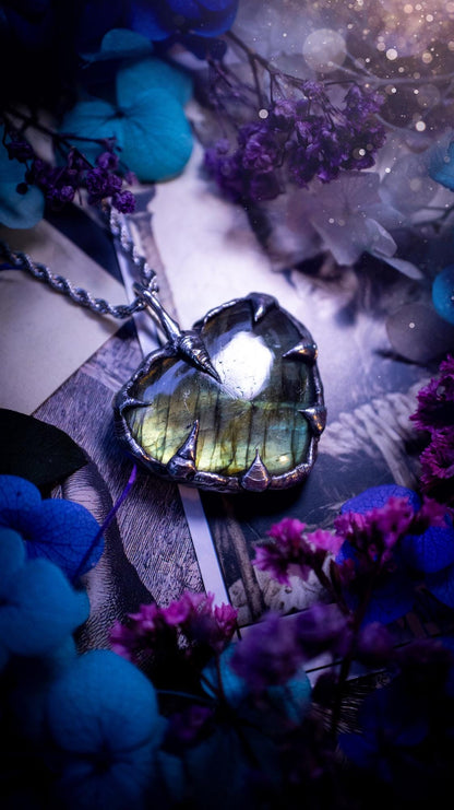 Beautiful, handmade and totally bespoke, green and yellow, labradorite crystal heart, pendant necklace. This jewellery piece has been handcrafted using the soft solder method, using lead free solder that contains silver, then oxidised to create a gothic mystical look. Featuring a beautiful multi flash labradorite heart with the flash shifting from green to yellow. A lovely piece ideal for anyone who loves crystals and jewellery. This is a one of a kind piece with no other the same, gothic design
