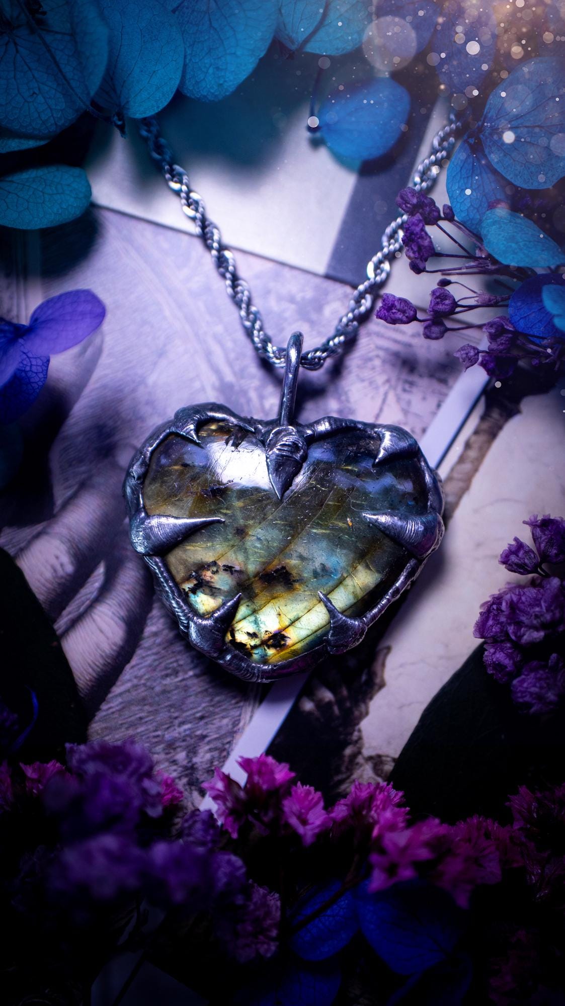 Beautiful, handmade and totally bespoke, green and yellow, labradorite crystal heart, pendant necklace. This jewellery piece has been handcrafted using the soft solder method, using lead free solder that contains silver, then oxidised to create a gothic mystical look. Featuring a beautiful multi flash labradorite heart with the flash shifting from green to yellow. A lovely piece ideal for anyone who loves crystals and jewellery. This is a one of a kind piece with no other the same, gothic design