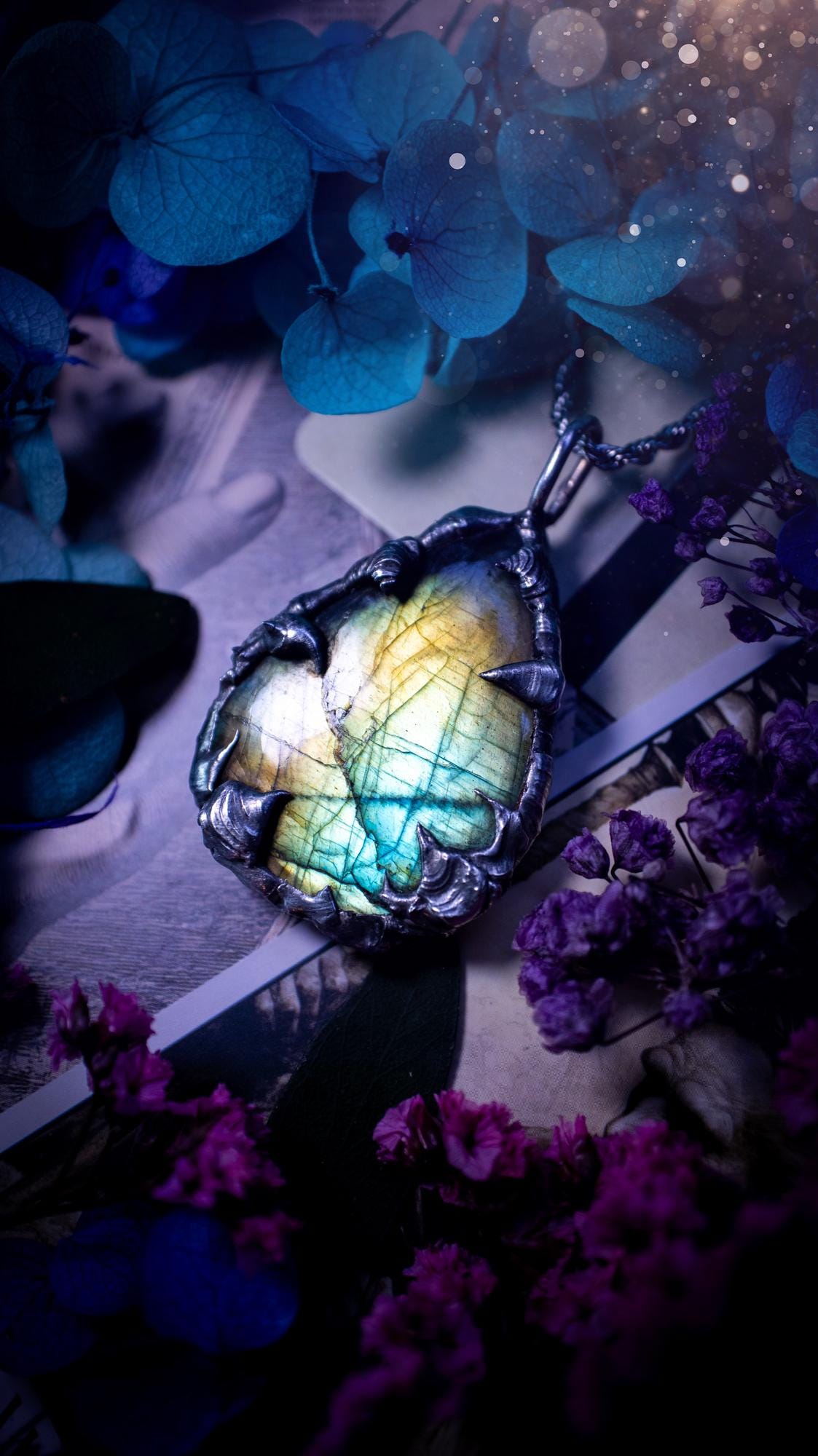 Beautiful, handmade and totally bespoke, green and blue, labradorite crystal, pendant necklace. This jewellery piece has been handcrafted using the soft solder method, using lead free solder that contains silver, then oxidised to create a gothic mystical look. Featuring a beautiful multi flash labradorite crystal with the flash shifting from green to blue. A lovely piece ideal for anyone who loves crystals and jewellery. This is a one of a kind piece with no other the same, gothic design