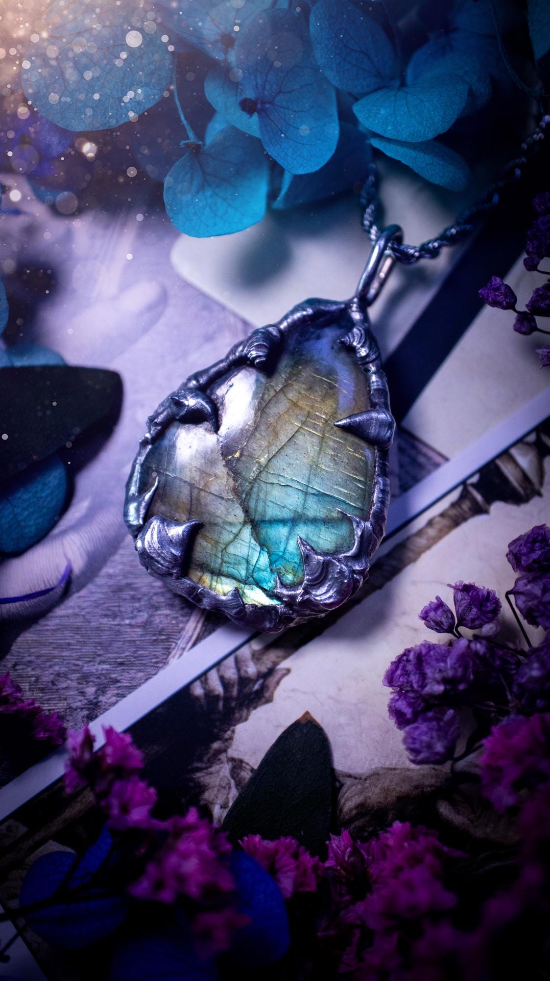 Beautiful, handmade and totally bespoke, green and blue, labradorite crystal, pendant necklace. This jewellery piece has been handcrafted using the soft solder method, using lead free solder that contains silver, then oxidised to create a gothic mystical look. Featuring a beautiful multi flash labradorite crystal with the flash shifting from green to blue. A lovely piece ideal for anyone who loves crystals and jewellery. This is a one of a kind piece with no other the same, gothic design