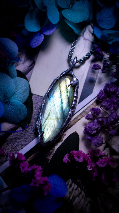 Beautiful, handmade and totally bespoke, green and blue, labradorite crystal, pendant necklace. This jewellery piece has been handcrafted using the soft solder method, using lead free solder that contains silver, then oxidised to create a gothic mystical look. Featuring a beautiful multi flash labradorite crystal with the flash shifting from green to blue. A lovely piece ideal for anyone who loves crystals and jewellery. This is a one of a kind piece with no other the same, gothic design