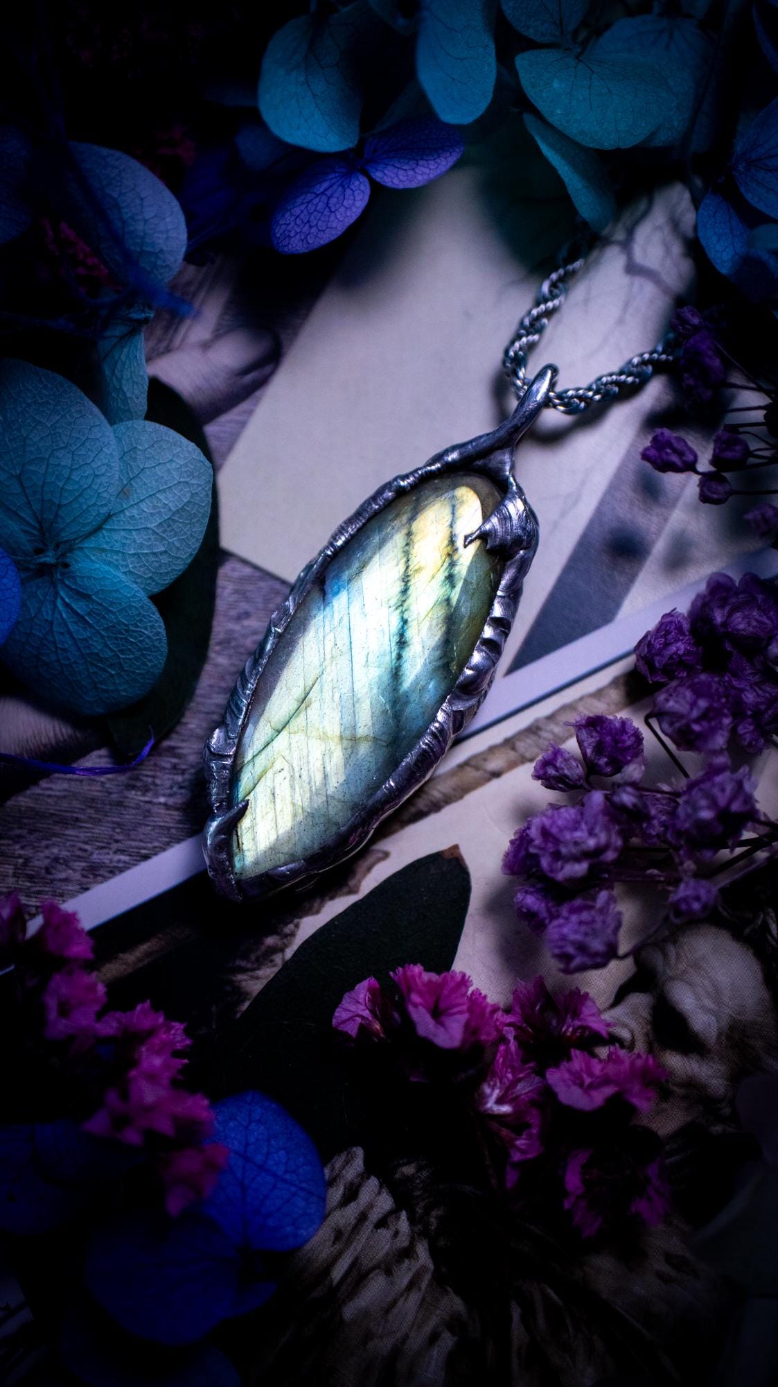 Beautiful, handmade and totally bespoke, green and blue, labradorite crystal, pendant necklace. This jewellery piece has been handcrafted using the soft solder method, using lead free solder that contains silver, then oxidised to create a gothic mystical look. Featuring a beautiful multi flash labradorite crystal with the flash shifting from green to blue. A lovely piece ideal for anyone who loves crystals and jewellery. This is a one of a kind piece with no other the same, gothic design