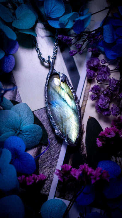 Beautiful, handmade and totally bespoke, green and blue, labradorite crystal, pendant necklace. This jewellery piece has been handcrafted using the soft solder method, using lead free solder that contains silver, then oxidised to create a gothic mystical look. Featuring a beautiful multi flash labradorite crystal with the flash shifting from green to blue. A lovely piece ideal for anyone who loves crystals and jewellery. This is a one of a kind piece with no other the same, gothic design