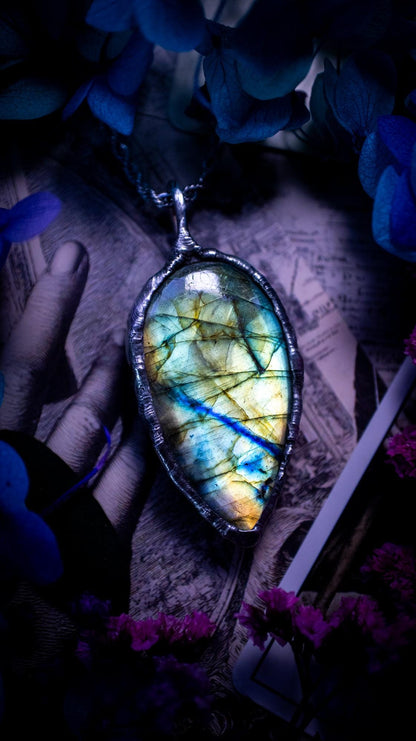 Beautiful, handmade and totally bespoke, green and blue, labradorite crystal, pendant necklace. This jewellery piece has been handcrafted using the soft solder method, using lead free solder that contains silver, then oxidised to create a gothic mystical look. Featuring a beautiful multi flash labradorite crystal with the flash shifting from green to blue. A lovely piece ideal for anyone who loves crystals and jewellery. This is a one of a kind piece with no other the same, gothic design