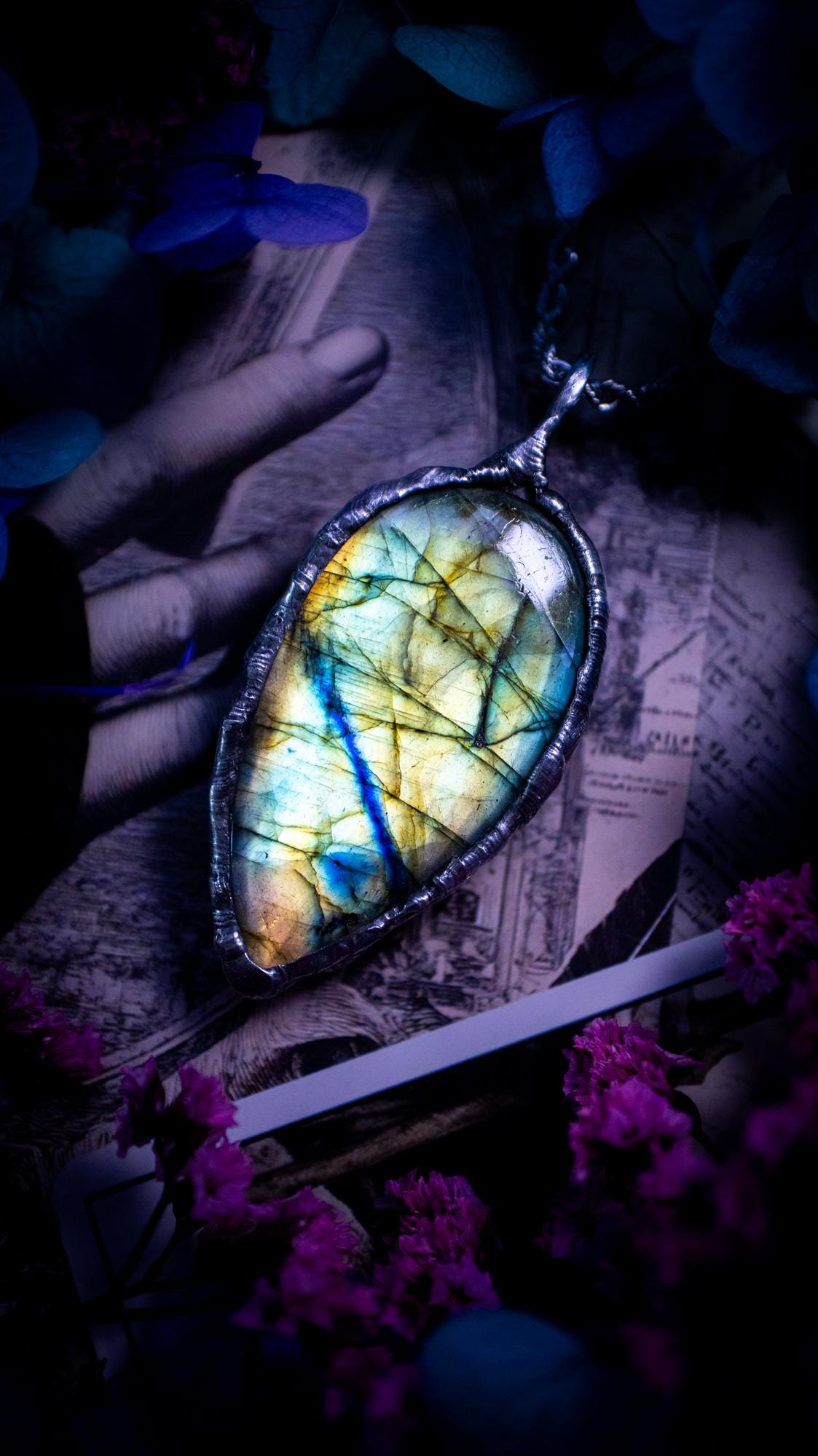 Beautiful, handmade and totally bespoke, green and blue, labradorite crystal, pendant necklace. This jewellery piece has been handcrafted using the soft solder method, using lead free solder that contains silver, then oxidised to create a gothic mystical look. Featuring a beautiful multi flash labradorite crystal with the flash shifting from green to blue. A lovely piece ideal for anyone who loves crystals and jewellery. This is a one of a kind piece with no other the same, gothic design