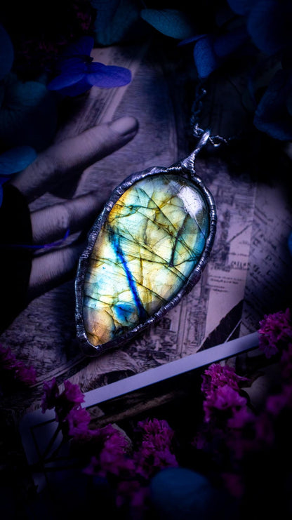 Beautiful, handmade and totally bespoke, green and blue, labradorite crystal, pendant necklace. This jewellery piece has been handcrafted using the soft solder method, using lead free solder that contains silver, then oxidised to create a gothic mystical look. Featuring a beautiful multi flash labradorite crystal with the flash shifting from green to blue. A lovely piece ideal for anyone who loves crystals and jewellery. This is a one of a kind piece with no other the same, gothic design