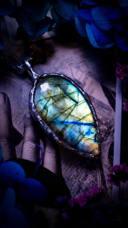 Beautiful, handmade and totally bespoke, green and blue, labradorite crystal, pendant necklace. This jewellery piece has been handcrafted using the soft solder method, using lead free solder that contains silver, then oxidised to create a gothic mystical look. Featuring a beautiful multi flash labradorite crystal with the flash shifting from green to blue. A lovely piece ideal for anyone who loves crystals and jewellery. This is a one of a kind piece with no other the same, gothic design