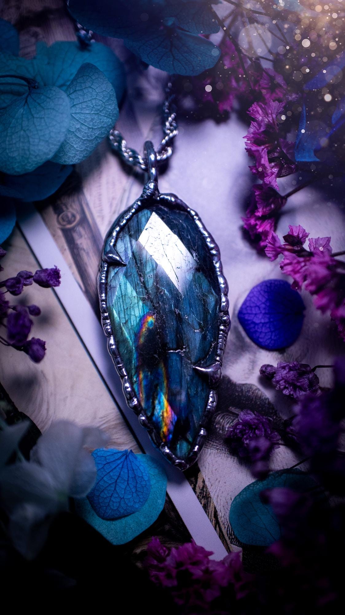 One of a kind, teal green and rainbow, soft soldered, Labradorite crystal pendant necklace. This pendant has been made with love and care, handcrafted using the tiffany technique, also known as soft solder method. The crystal has a bezel of solder that contains various metals including silver and is hypoallergenic. Featuring a stunning, natural and unique coloured Labradorite crystal. This jewellery piece is ideal for gifting and for anyone who loves crystals and jewellery with a gothic vibe.