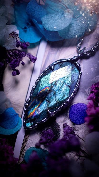 One of a kind, teal green and rainbow, soft soldered, Labradorite crystal pendant necklace. This pendant has been made with love and care, handcrafted using the tiffany technique, also known as soft solder method. The crystal has a bezel of solder that contains various metals including silver and is hypoallergenic. Featuring a stunning, natural and unique coloured Labradorite crystal. This jewellery piece is ideal for gifting and for anyone who loves crystals and jewellery with a gothic vibe.