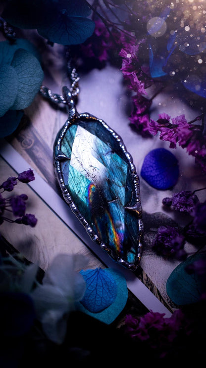 One of a kind, teal green and rainbow, soft soldered, Labradorite crystal pendant necklace. This pendant has been made with love and care, handcrafted using the tiffany technique, also known as soft solder method. The crystal has a bezel of solder that contains various metals including silver and is hypoallergenic. Featuring a stunning, natural and unique coloured Labradorite crystal. This jewellery piece is ideal for gifting and for anyone who loves crystals and jewellery with a gothic vibe.