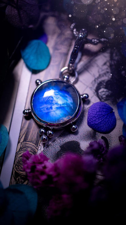 Beautifully handmade, high grade, rainbow moonstone, crystal pendant necklace. This one of a kind necklace features a beautiful, very high grade flashy blue rainbow moonstone. Handcrafted using a mix of fine and sterling silver, with pretty little ball accents and a stamped patterned bail. This cute little jewellery piece is ideal for anyone who loves crystals and jewellery. A one off piece with no other being the same, ideal for gifting for any occasion.