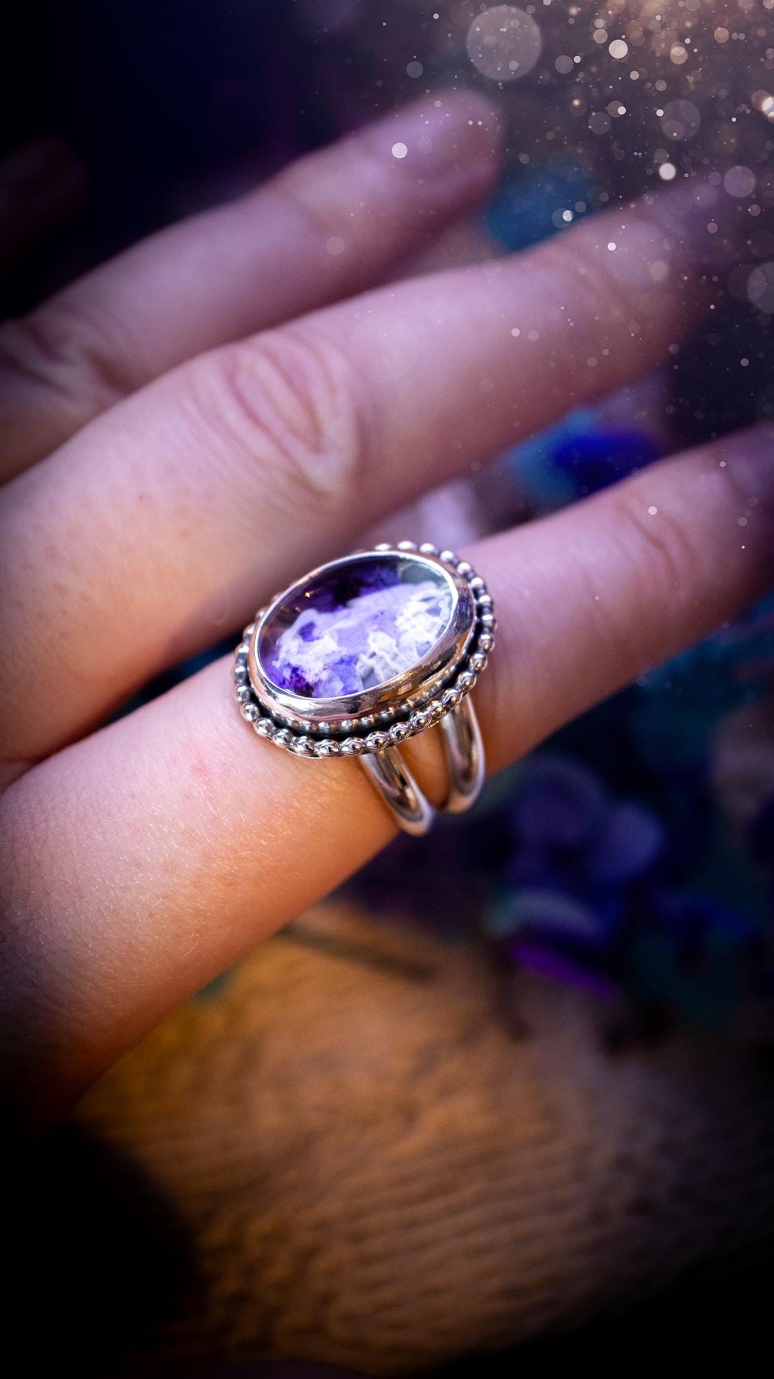 Beautiful and one of a kind, quartz crystal, botanical mini statement ring. This ring has been made by placing lace and real dried flowers under a smooth, quartz crystal. Handmade from fine and sterling silver, featuring a smooth bezel, beaded wire around the bezel and a smooth double ring band. A very unique piece to gift to a loved one who may love crystals and flowers. Ideal for birthdays, anniversaries, and any special occasion. A unique take to sterling silver jewellery.