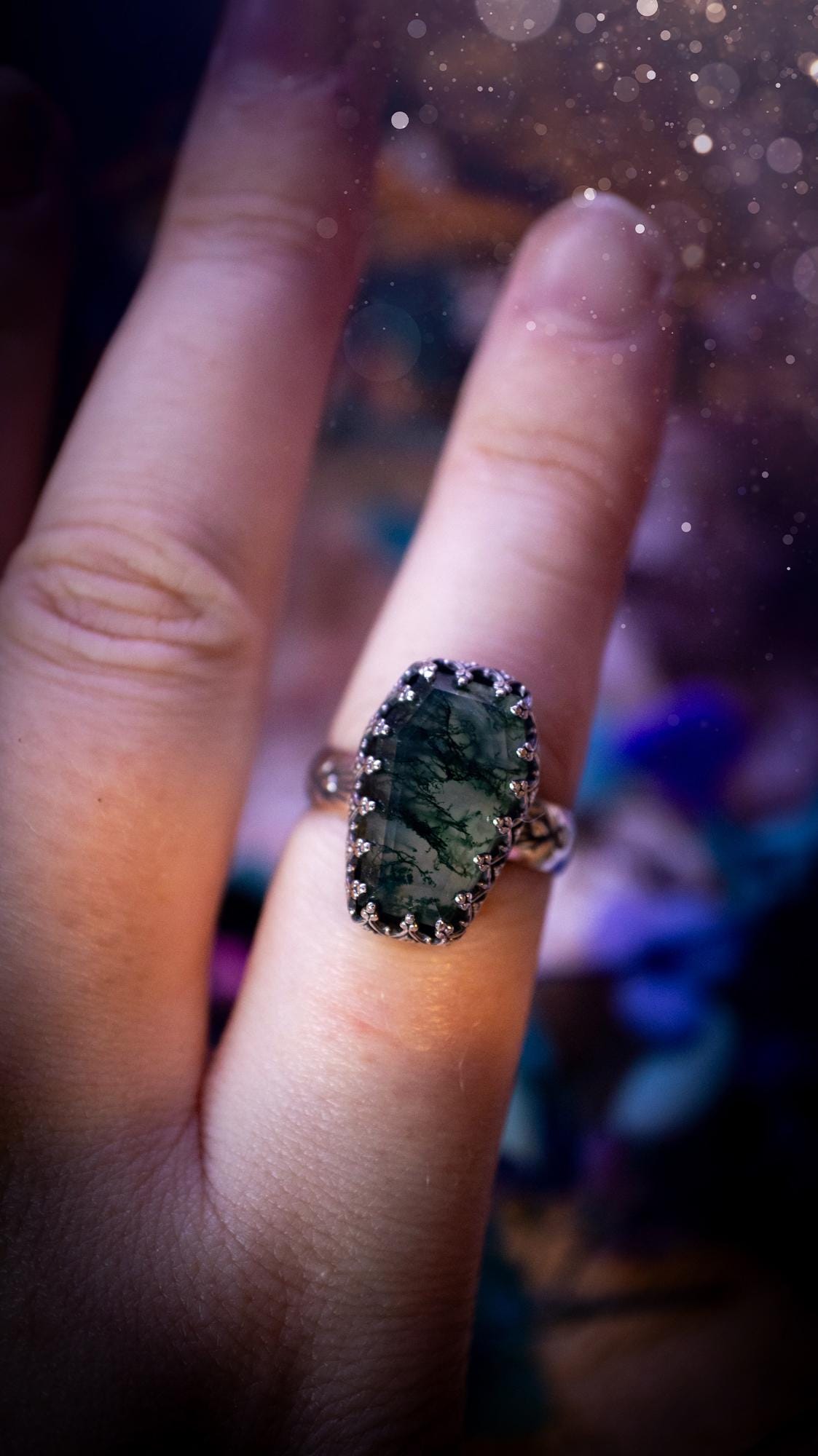 Beautiful and completely handmade, moss agate coffin, gothic style, mini statement stacker ring. This ring has been handcrafted using a mix of fine and sterling silver. Featuring a beautiful, very mossy, moss agate gemstone. The crystal is step cut for a sparkle and is full of flash! Around the moss agate is a gothic gallery wire bezel for extra gothic vibes. The ring shank has a one of a kind stamped pattern. Ideal for birthdays and special occasions. Gothic and witchy jewellery.