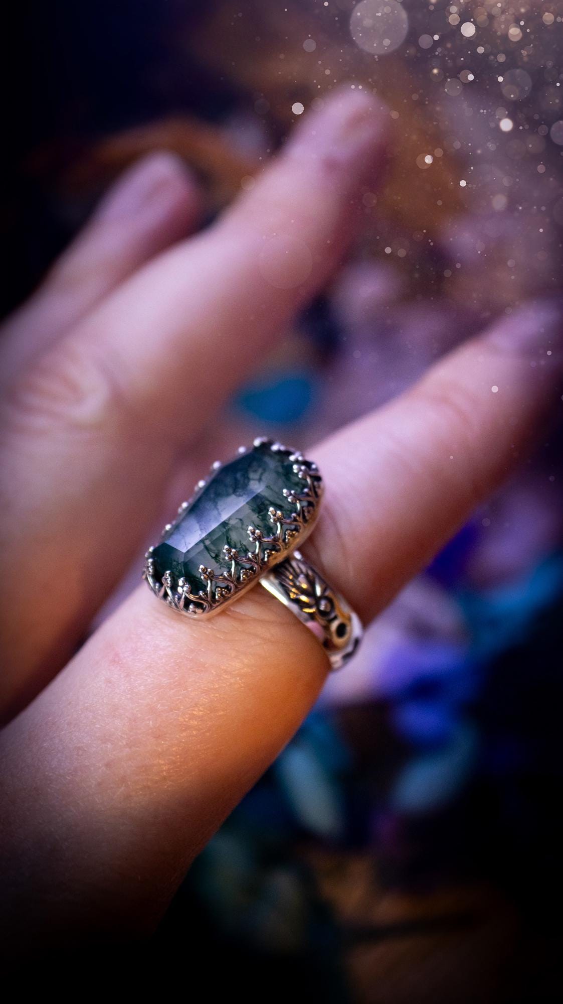 Beautiful and completely handmade, moss agate coffin, gothic style, mini statement stacker ring. This ring has been handcrafted using a mix of fine and sterling silver. Featuring a beautiful, very mossy, moss agate gemstone. The crystal is step cut for a sparkle and is full of flash! Around the moss agate is a gothic gallery wire bezel for extra gothic vibes. The ring shank has a one of a kind stamped pattern. Ideal for birthdays and special occasions. Gothic and witchy jewellery.