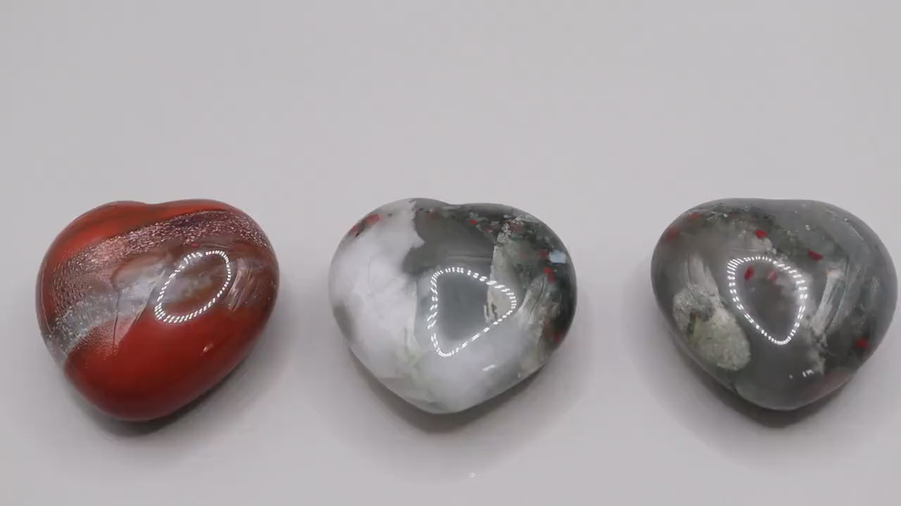 Beautiful, African Bloodstone puffy mini hearts. Beautiful red speckles, and gorgeous patterns. Approximately: Height 3 cm, Width 3 cm, Depth 1.5 cm  Average weight: 20 grams each. Ideal as pocket crystal and little gifts for crystal lovers.