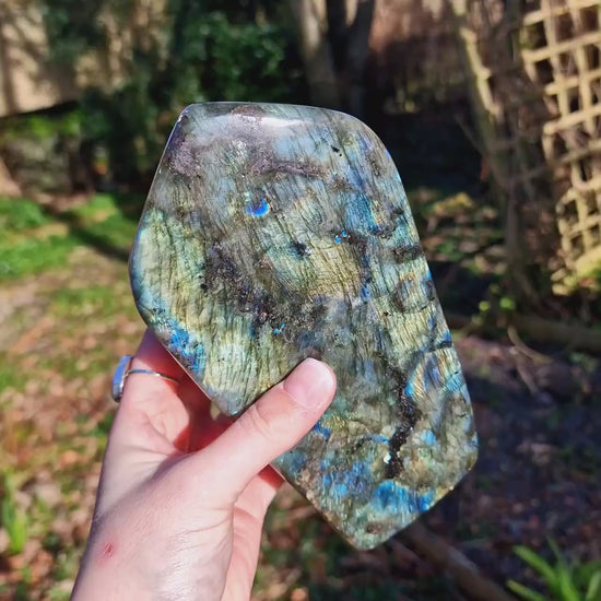 Beautiful Labradorite natural crystal freeform. This beautiful labradorite is full of flash, with multiple  colours of blue, greens and yellows. Ideal for crystal lovers and meditation purposes