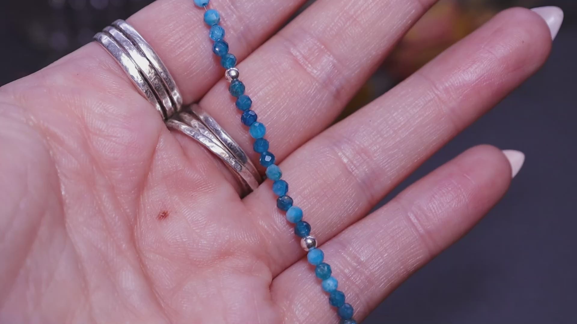 Handmade, faceted natural apatite beaded bracelet, made to order. Featuring vibrant blue-green apatite beads, perfect for stacking with other bracelets. Each bracelet is uniquely crafted, showcasing the natural beauty of the stones with a sleek, faceted design. Ideal for layering to create a personalized, stylish look.