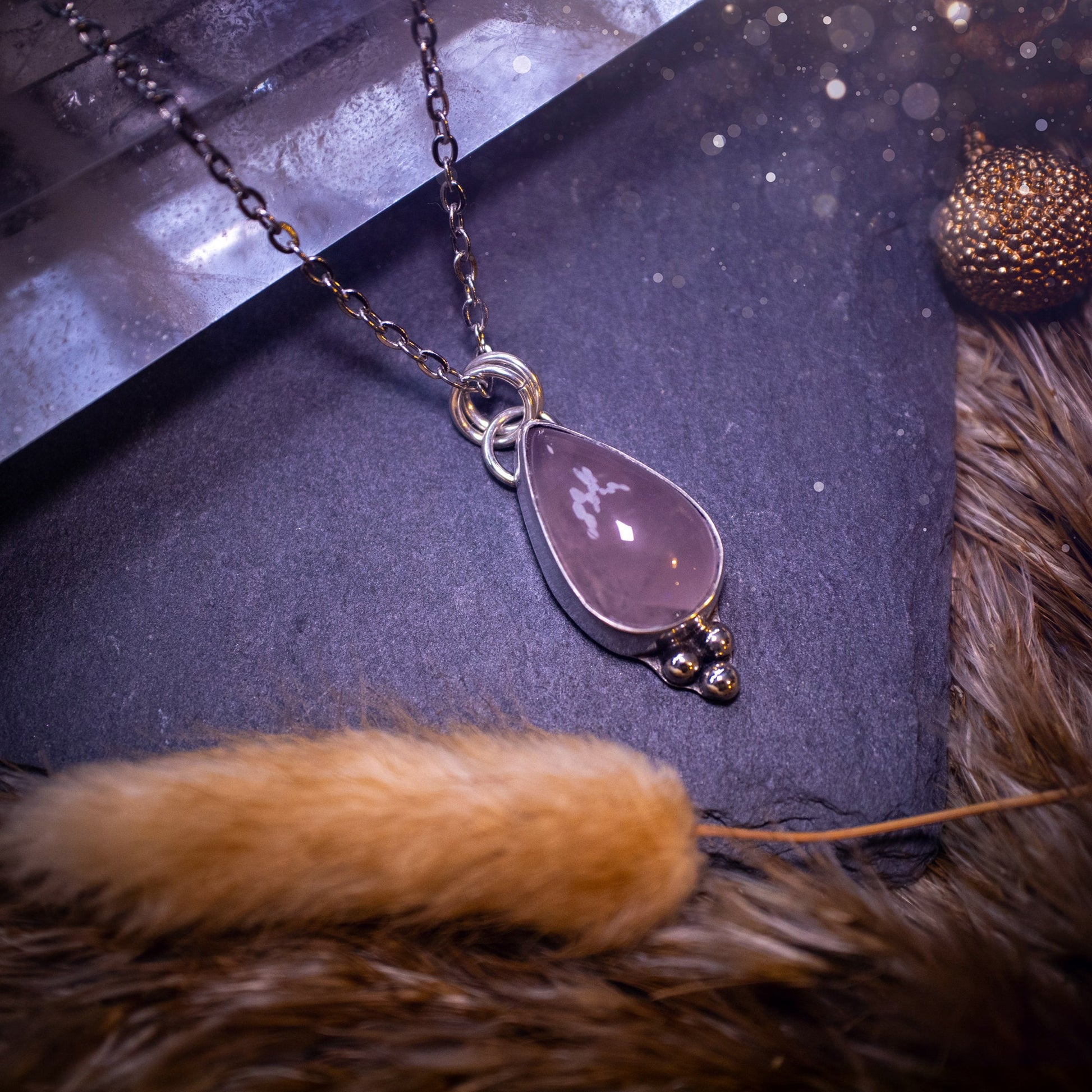 Gorgeous pink, rose quartz, handmade pendant. This beautiful piece of jewellery has been crafted with love and care and is made from a mix of fine and 925 sterling silver. The idea gift for that special person.