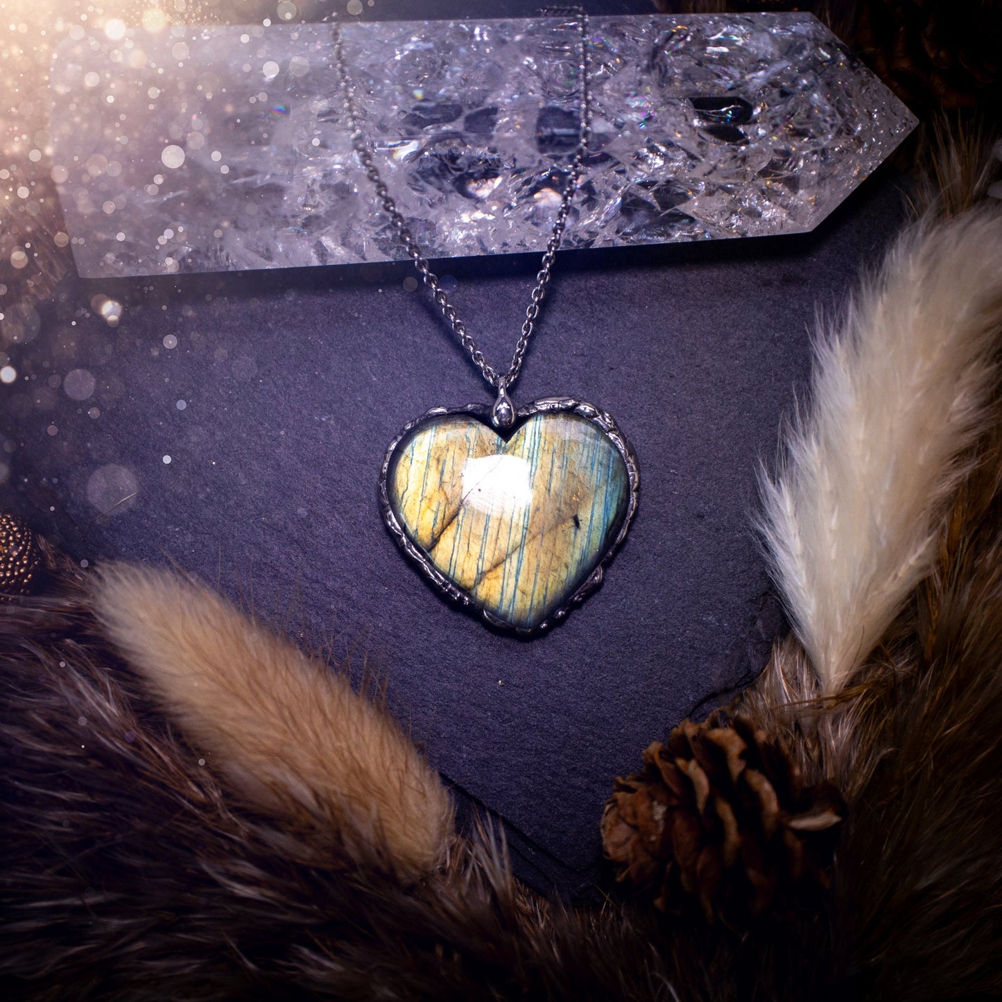 Beautiful autumn greens and yellow, labradorite heart, soft soldered pendant. This beautiful heart pendant is sure to turn heads with its beautiful array of colours and flash. Ideal gift for any crystal lover