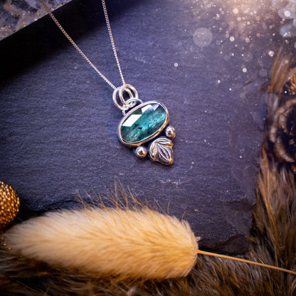 Made to order - Stunning, handmade, Teal Kyanite crystal, sterling silver pendant. Teal Kyanite pendant made to order and handmade by myself with love and care. It features a beautiful, rose cut, natural teal, kyanite gemstone that has an array of sea greens, blues and a gorgeous sparkle! Ideal gift for jewellery lover