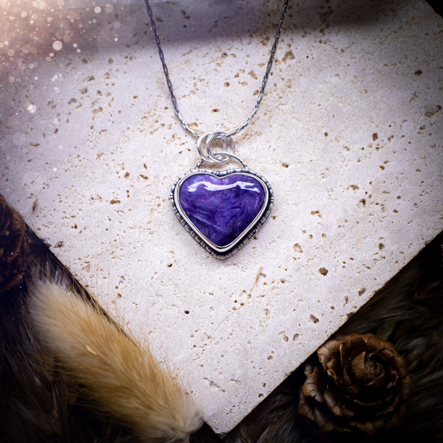 Gorgeous and small, charoite heart crystal, pendant necklace. Made from fine and sterling silver, and featuring a cute little charoite heart! This necklace is handmade and the ideal gift for loved ones, and crystal lovers. Hippy, gothic style.