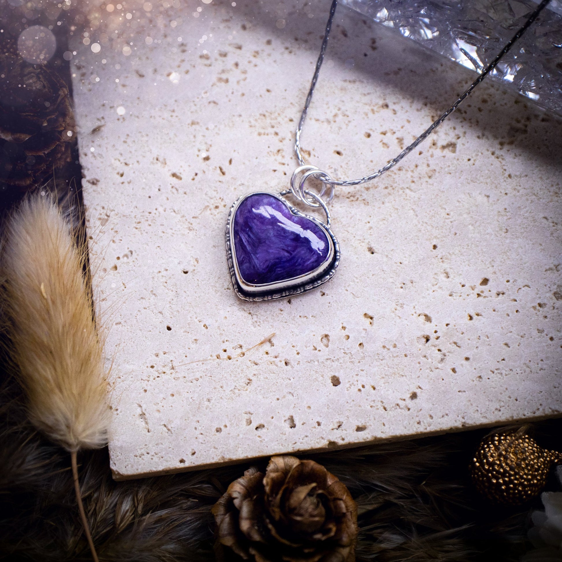 Gorgeous and small, charoite heart crystal, pendant necklace. Made from fine and sterling silver, and featuring a cute little charoite heart! This necklace is handmade and the ideal gift for loved ones, and crystal lovers. Hippy, gothic style.