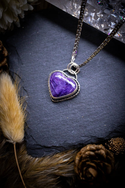 Gorgeous and small, charoite heart crystal, pendant necklace. Made from fine and sterling silver, and featuring a cute little charoite heart! This necklace is handmade and the ideal gift for loved ones, and crystal lovers. Hippy, gothic style.